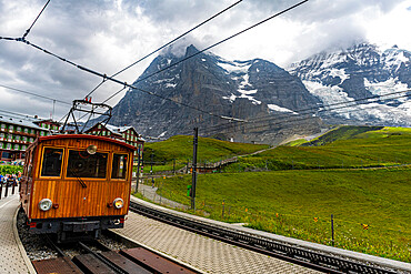 The Jungfrau railway below the Eiger North Face, Kleine Scheidegg, Bernese Oberland, Switzerland, Europe