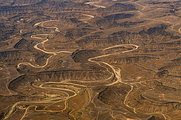 Aerial of dry canyons in the south of Rub al Khali, Salalah, Oman, Middle East