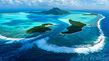 Aerial of the lagoon of Maupiti, Society Islands, French Polynesia, South Pacific, Pacific