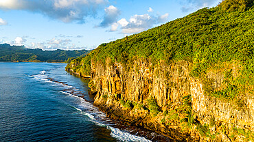 Limestone cliffs at sunset, Rurutu, Austral islands, French Polynesia, South Pacific, Pacific