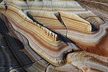 Aerial of multicoloured layers of sandstone, Kyzylkup, Mangystau, Kazakhstan