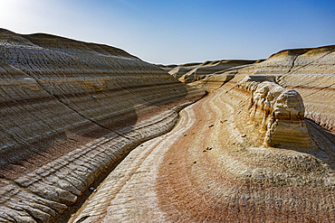 Aerial of multicoloured layers of sandstone, Kyzylkup, Mangystau, Kazakhstan