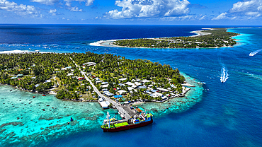 Aerial of the Rangiroa atoll and the Tiputa Pass, Tuamotus, French Polynesia, South Pacific, Pacific