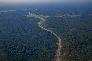 Empty highway in the jungle, future capital Ciudad de la Paz, Rio Muni, Equatorial Guinea, Africa