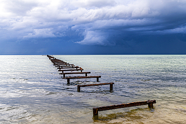 Destroyed pier at a Luxury hotel in Hotel el Colony before a storm, Isla de la Juventud (Isle of Youth), Cuba, West Indies, Central America