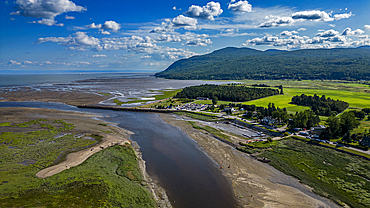 Aerial of the Gouffre River flowing in the St. Lawrence River, Quebec, Canada, North America