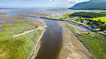 Aerial of the Gouffre River flowing in the St. Lawrence River, Quebec, Canada, North America