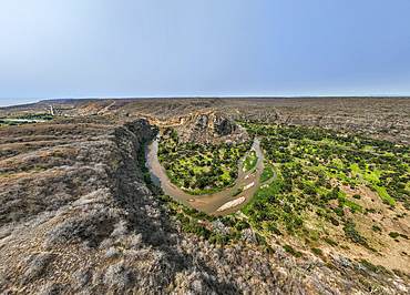 Aerial of the horseshoe bend of the Rio Cubal Canyon, Angola, Africa