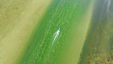 Boat in the turquoise waters of the Klein River Lagoon, Hermanus, Western Cape Province, South Africa, Africa