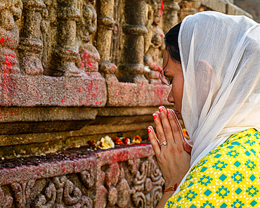 Female devotee praying, Kamakhya Temple, Guwahati, Assam, India, Asia