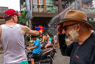 Songkram Thai Buddhist New Year parade, blessings and water battles celebrations in Chiang Mai, Thailand