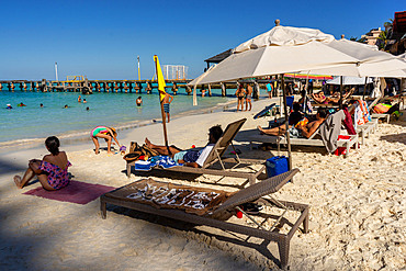 Mexican and foreign tourists in the Caribbean beaches of Cancun, Quintana Roo state,Mexico