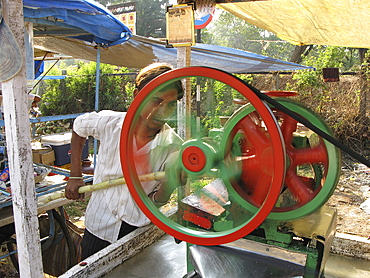 India. Sugar cane juice vendor in mumbai