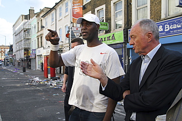 Labour party candidate for mayor of london ken livingston inspects damage to property after rioting and looting in croydon, london, uk