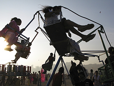 India. Childrens playground in chowpatty beach, mumbai. Photo julio etchart