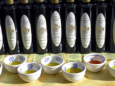 Uk olive oil and balsamic vinegar for sale at a stall at broadway market in east london