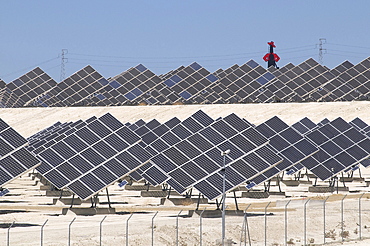 Spain.solar panels creating renewable energy from the sun, with a cut,out for tio pepe sherry near jerez in andalucia