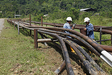 Oil extraction and pollution in the Amazon, Huaorani Amerindians trying to survive through eco-tourism against the threat of oil multinationals, Yasuni National Park, Amazon, Ecuador, South America