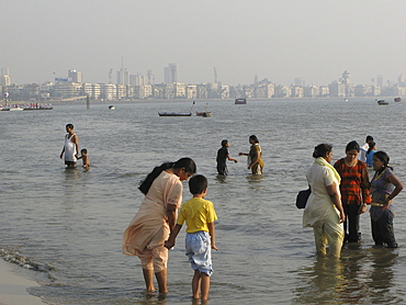 India. People bathing in chowpatty beach, mumbai