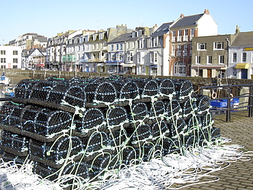 Uk fish cages in the harbour at ilfracombe, devon