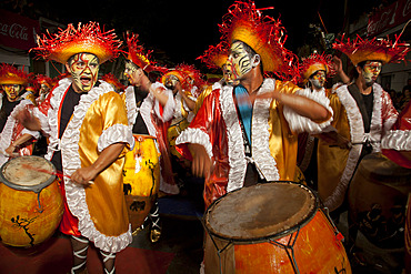 Traditional Murgas and samba schools during the Llamadas procession that starts the carnival in Montevideo, Uruguay, South America