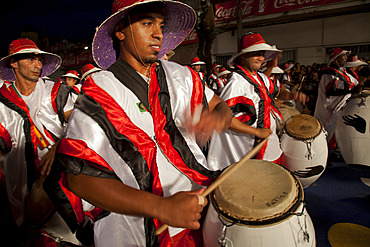 Traditional Murgas and samba schools during the Llamadas procession that starts the carnival in Montevideo, Uruguay, South America