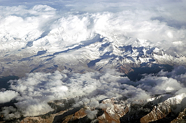 Andes, chile. View over the andes mountains, towards the argentinian border. Near mauna kea (world s tallest mountain). Storm clouds approach the mountains