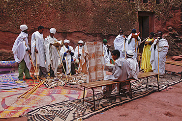 Priests singing during Easter Orthodox Christian religious celebrations in the ancient rock-hewn churches of Lalibela, Ethiopia, Africa