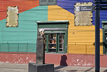 Statue of famous local painter Quinquela Martin at Caminito alley in the Boca, old Italian quarter of Buenos Aires, Argentina, South America