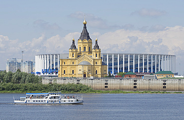 View of the Alexander Nevsky Cathedral and 2018 World Cup football stadium in Nizhny Novgorod across the Volga River, Russia, Europe