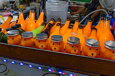 Tropical fruit juices for sale at a market stall. Chiang Mai, Thailand