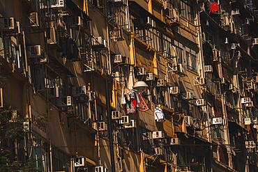 Typical Hong Kong homes in Kowloon with Air Conditioners hanging out the windows