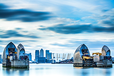 Thames Barrier on River Thames and Canary Wharf in the background, London, England, United Kingdom, Europe