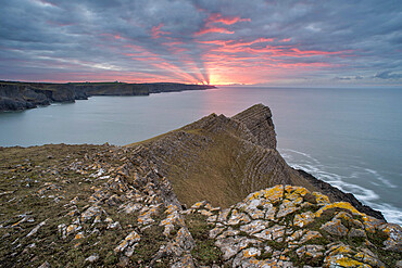 View towards Fall Bay and Mewslade Bay, at sunrise, Gower Peninsula, South Wales, United Kingdom, Europe