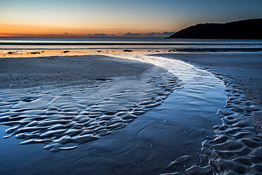 Oxwich beach at low tide at dawn, Gower Peninsula, South Wales, United Kingdom, Europe