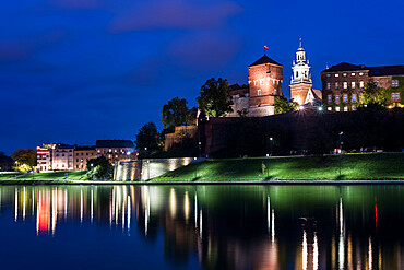 Wawel Castle, UNESCO World Heritage Site, across Vistula River, at night, Krakow, Poland, Europe