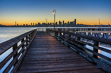 Wooden pier and skyline at dawn, Alki Beach, Seattle, Washington State, United States of America, North America