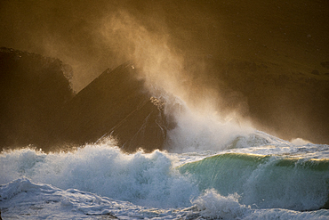 Waves crashing against rocks, Clogher Strand, Dingle Peninsula, County Kerry, Munster, Republic of Ireland, Europe