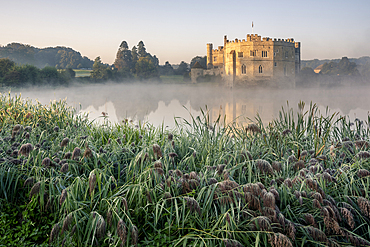 Leeds Castle in morning mist, near Maidstone, Kent, England, United Kingdom, Europe