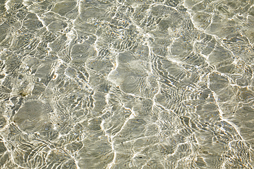 Sparkling shallows over a sandy seabed, in a shallow lagoon close to the shore of Havodda Island; Gaafu Dhaalu atoll, in the far south of the Maldives, Indian Ocean.