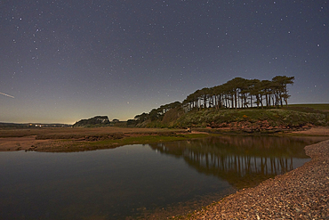 The night sky over the estuary of the River Otter, at Budleigh Salterton, on the Devon coast, Great Britain.