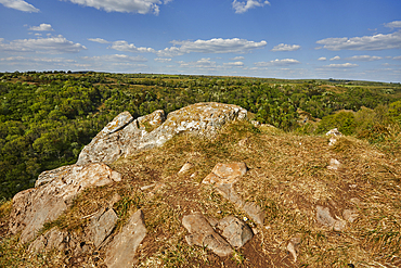 Limestone rocks on the edge of a cliff in Cheddar Gorge, in the Mendip Hills, Somerset, Great Britain.