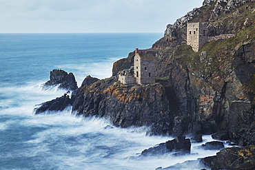 A dusk view of the iconic cliffside ruins of Botallack tin mine, UNESCO World Heritage Site, near St. Just, near Penzance, in west Cornwall, England, United Kingdom, Europe