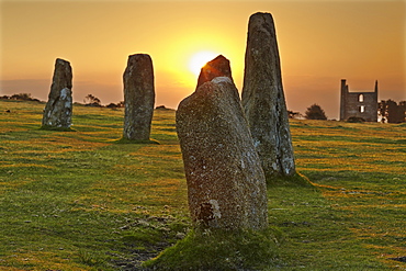 Sunrise over standing stones at the Hurlers, a series of prehistoric stone circles on Bodmin Moor, near Liskeard, east Cornwall, England, United Kingdom, Europe