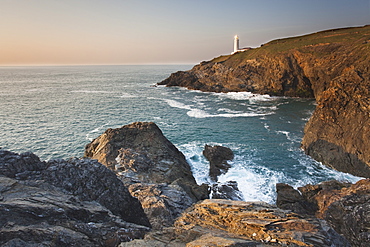 A peaceful dusk on Cornwall's Atlantic coast, showing the lighthouse at Trevose Head, near Padstow, Cornwall, England, United Kingdom, Europe