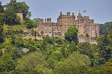 The historic Dunster Castle, on the edge of the village of Dunster, Exmoor National Park, Somerset, England, United Kingdom, Europe