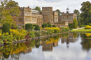 The abbey buildings seen across the Long Pond, at Forde Abbey and Gardens, near Chard, Somerset, England, United Kingdom, Europe