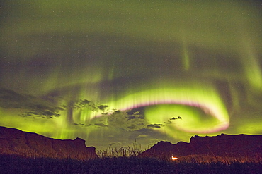 The Aurora Borealis (Northern Lights), seen in the night sky above Vik, on the south coast of Iceland, Polar Regions