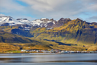 A classically rugged landscape overshadows the town of Grundarfjordur, on the Snaefellsnes peninsula, western Iceland, Polar Regions