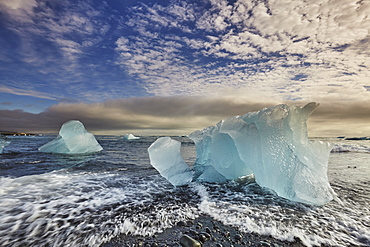 Melting glacial ice, carved from the Vatnajokull icecap, on the beach at Jokulsarlon, on the south coast of Iceland, Polar Regions